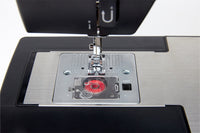 Inserting a Top Drop-In Bobbin