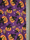 Halloween Smiling Pumpkins and Witches Brooms on Purple 100% Cotton Fabric