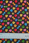 Dog Puppies Bones Paws and Hearts on Black Novelty 100% Cotton Price Per Yard