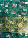Calcetines navideños vintage con ardillas sobre fondo verde, 100 % algodón ligero. Precio por yarda.