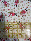 Papá Noel y bastones de caramelo sobre fondo crema, 100 % algodón. Precio por yarda