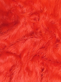 Tejido de piel sintética mongola rizada, de pelo largo y color rojo liso / Se vende por yardas