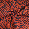 Tejido de forro polar con estampado de tigre — Se vende por yardas