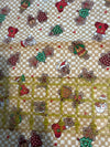 Calcetines navideños vintage de pan de jengibre sobre fondo de cuadros color crema, 100 % algodón ligero. Precio por yarda.
