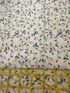 Luces navideñas vintage sobre fondo crema, 100 % algodón ligero. Precio por yarda.