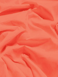 Tejido liso de poliéster y algodón, ancho 147 cm/152 cm / Color coral / Se vende por metros