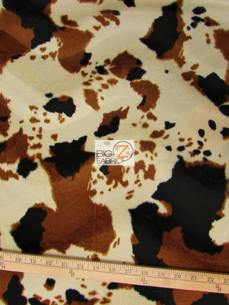 Tejido de felpa de pelo corto con estampado de vaca en marrón, negro y blanco roto / Se vende por metros||color: Marrón/Negro con estampado de vaca