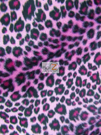 Tejido de felpa rosa con estampado de guepardo / Se vende por metros