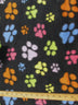 Multi-Color Paw Print Black Fleece Fabric