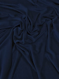 TELA DE TERCIOPELO ELÁSTICO CON PURPURINA, 360 GRAMOS DE SPANDEX / Azul marino / Se vende por yarda