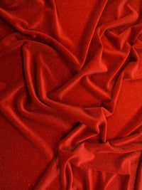 TELA DE TERCIOPELO ELÁSTICO CON PURPURINA, 360 GRAMOS DE SPANDEX / Rojo / Se vende por yarda
