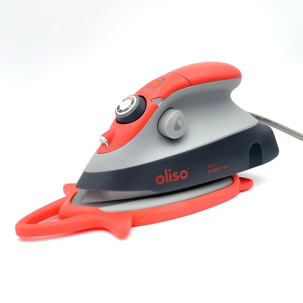 Mini plancha Oliso M3 Pro con salvamanteles Coral