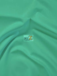 Tejido de poliéster y algodón, liso, de gran gramaje, tipo uniforme / color verde azulado / se vende por metros