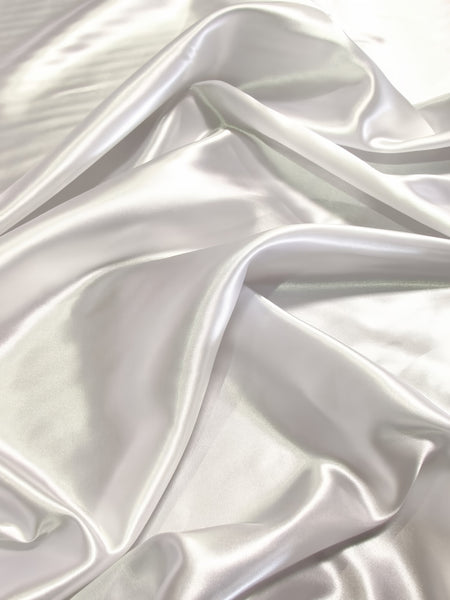 Tissu satiné brillant, uni, d'épaisseur moyenne / Blanc