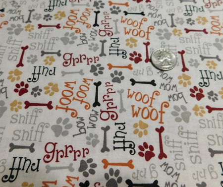 Tela con motivos de cachorros, 100 % algodón, color crema. Precio por yarda.