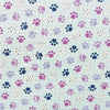 Cachorros con motivos de patitas sobre tela de cuadros vichy azul claro, 100 % algodón. Precio por yarda.