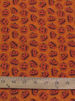 Tissu en polycoton orange « Citrouilles d'Halloween »