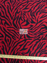 Tejido de felpa rojo con estampado de cebra