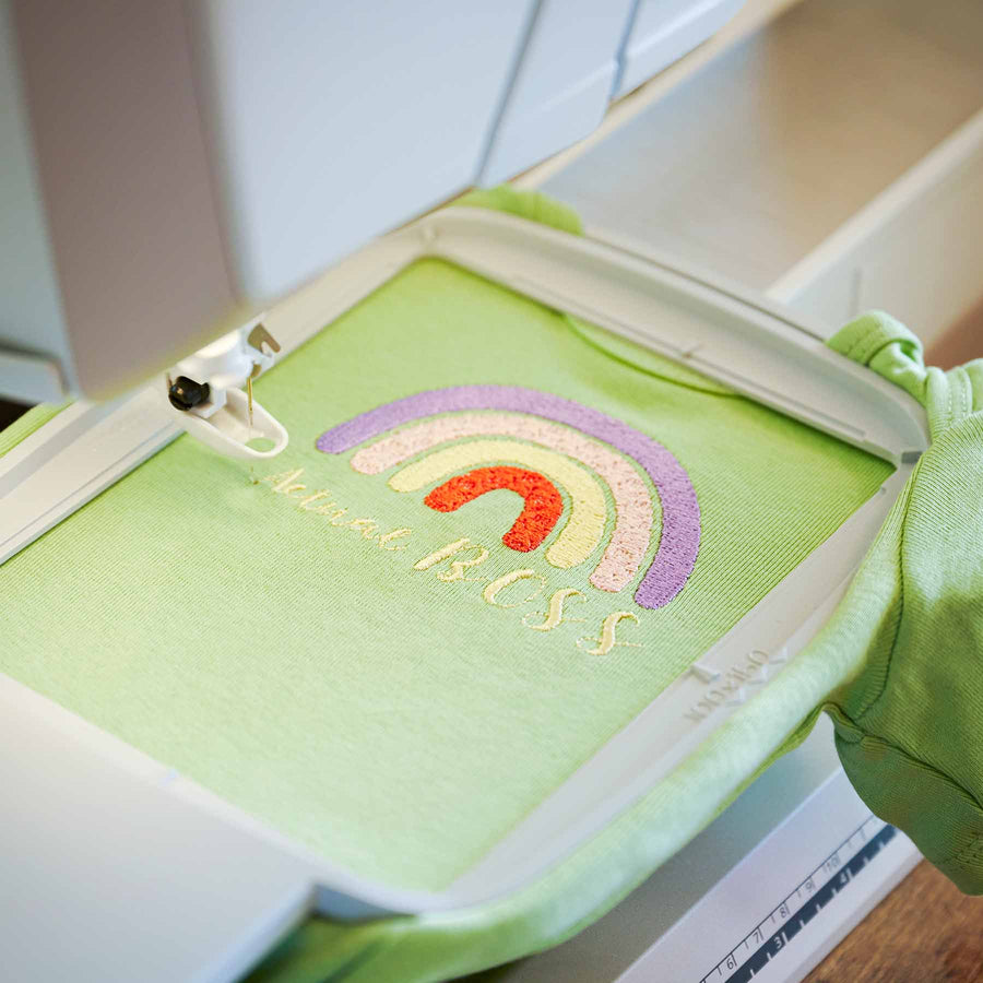 Free-arm embroidery on a tubular garment using the optional DESIGNER EPIC 3 Free-Arm Hoop