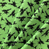 Tela verde 100 % algodón con brujas volando en escobas por Halloween