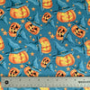 Halloween Fabric Smiling Pumpkins Jack o Lantern on Blue by the yard