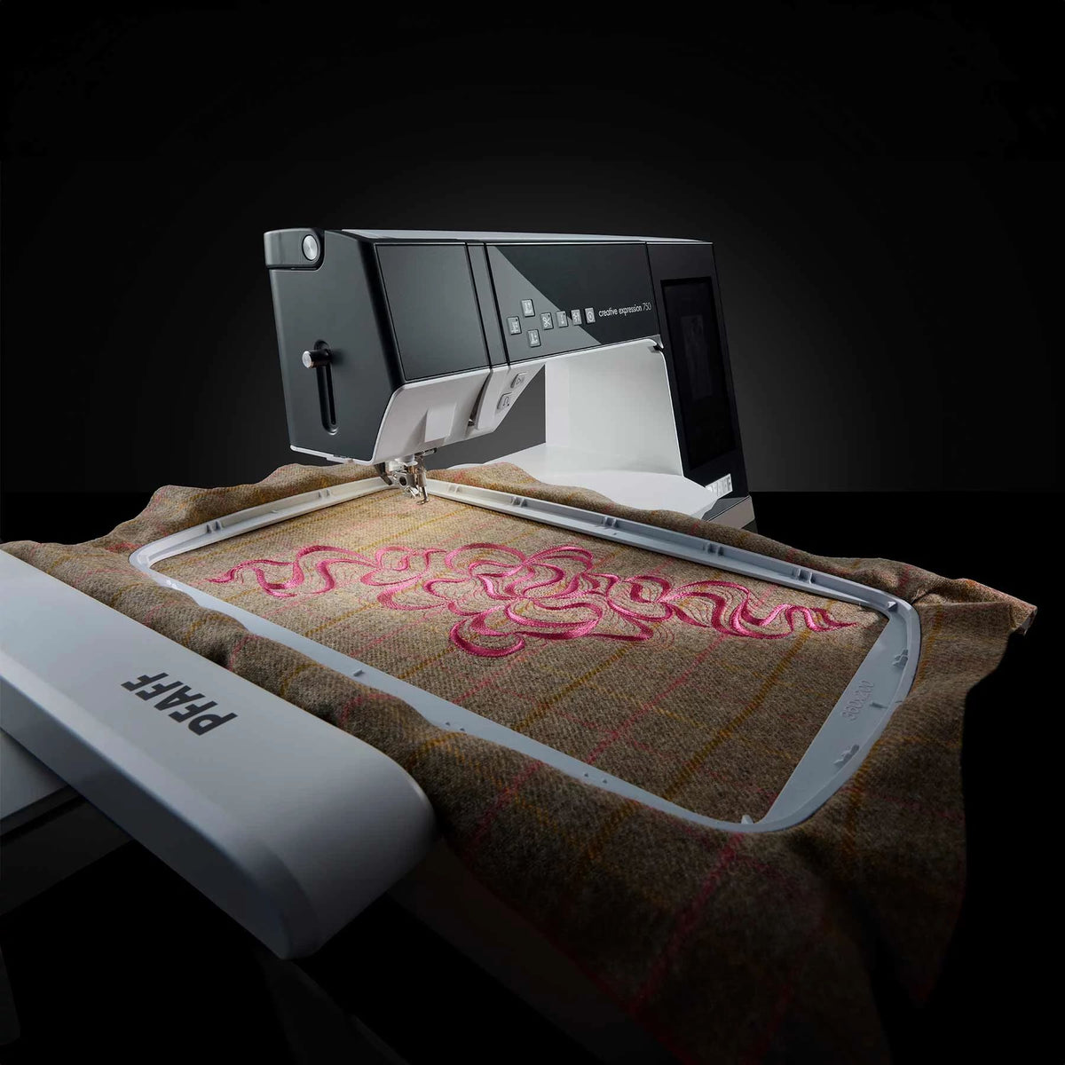 Large pink embroidery design being stitched by the PFAFF creative expression 750